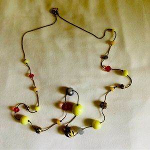 Goldtoned Beaded Necklace in yellow, pink, grayish lavender, 18” drop